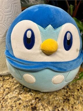 Squishmallows Blue and White Piplup Plush with Yellow Beak
